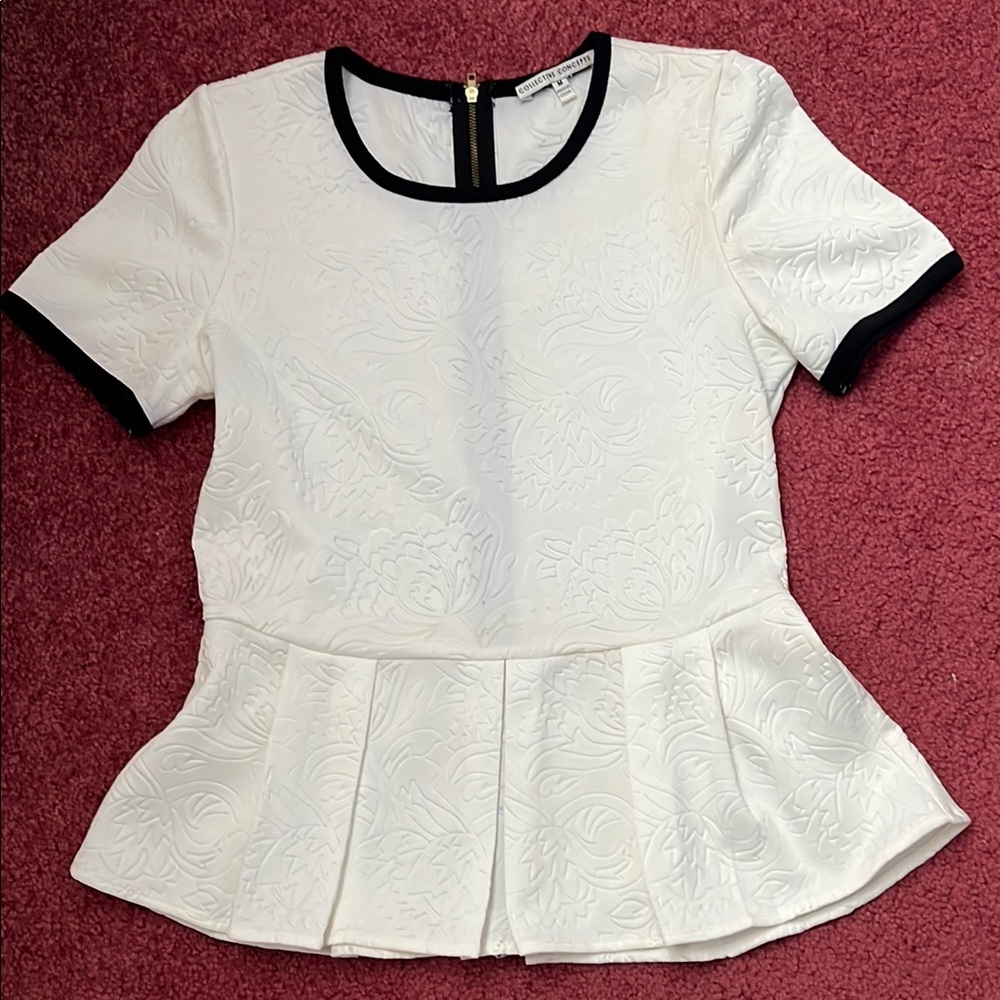 Elegant White Peplum Top with Black Trim